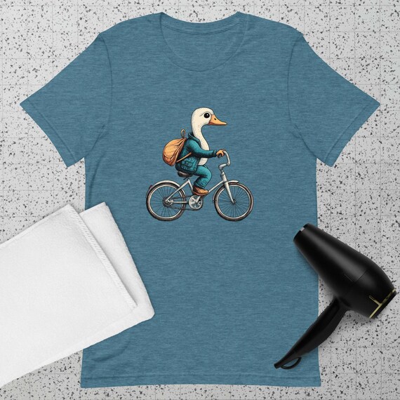 Unisex t-shirt Duck/Goose on a Bicycle: A Hilarious Ride on Two Wheels – Graphic Tee