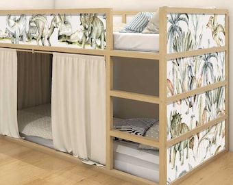 May include: A wooden bunk bed with a white and green dinosaur and jungle themed wallpaper. The top bunk has a white and blue striped pillow and a white curtain. The bottom bunk has a white curtain and a black and white striped pillow.