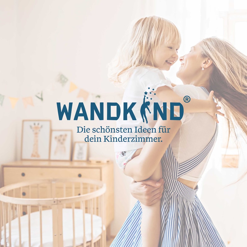 May include: A woman holding a young child in her arms. The woman is smiling and looking at the child. The child is also smiling and looking at the woman. The text "WANDKIND&reg;" is displayed in blue letters with the tagline "Die sch&ouml;nsten Ideen f&uuml;r dein Kinderzimmer." in black letters.