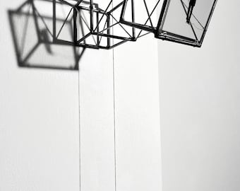 Metal wall art sculpture: Hanging by a Thread, light and shadow home decor