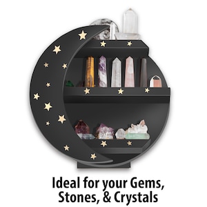 May include: Black crescent moon-shaped shelf with gold stars and two shelves for displaying crystals, gems, and stones.