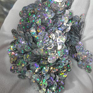 Silver holographic iridescent top hole round flat sequins 6mm bulk 25 gram 1500 pieces / 50 gram 3000 pieces / 100 gram 6000 pieces