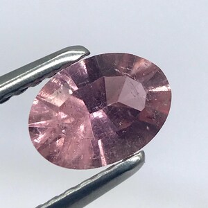 Pink Tourmaline Gemstone: 0.72 Carat Oval Conecut, 7x5mm