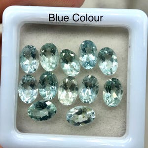 Gema de berilo natural azul verdoso-amarillo: talla ovalada, 6 x 4 mm