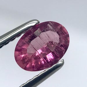 Pink Tourmaline Gemstone: 0.70 Carat Oval Conecut, Natural