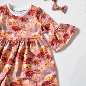 Baby girls autumn foliage falling leaves handmade romper, leggings and dress options with matching bib, turban and headband options.