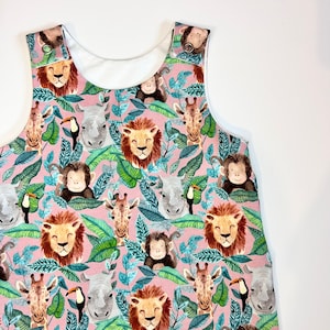 Baby girls pink girly jungle safari animal romper, leggings and romper dress options with matching bib and headband options. Holiday outfit