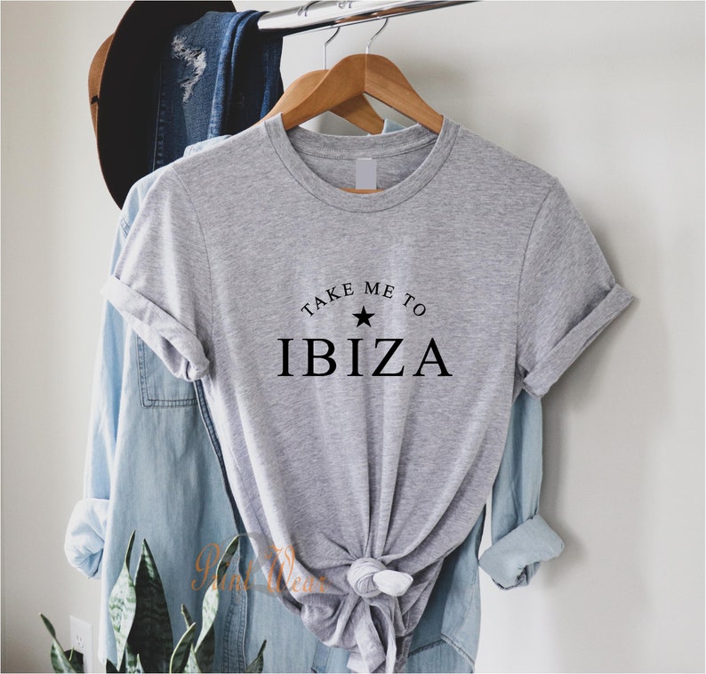 May include: Gray t-shirt with the text "Take Me To Ibiza" and a black star.