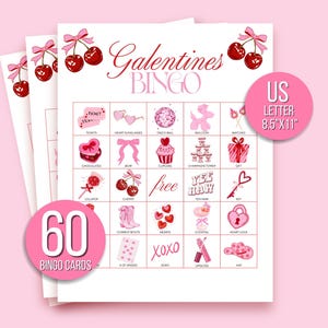 May include: A stack of Galentine's Bingo cards with a pink and red theme. The cards feature illustrations of cherries, hearts, and other Valentine's Day-related images. The text "Galentines Bingo" is displayed at the top. The cards are US Letter size, 8.5"x11".
