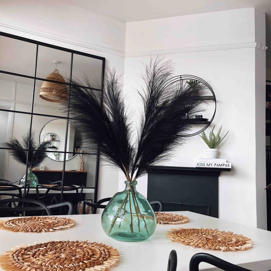 large black vase with pampas grass