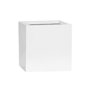 May include: A white square planter made of a smooth material. The planter is empty and ready for a plant.