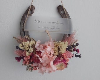 Pink horseshoe with dried flowers, lucky charm, gift, souvenir