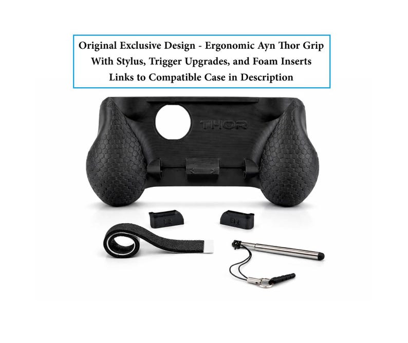 May include: A black ergonomic Ayn Thor grip featuring a textured surface, a circular cutout, and the word THOR embossed on the front. Included are two black trigger upgrades, a black foam insert strip, and a silver stylus with a black tether.