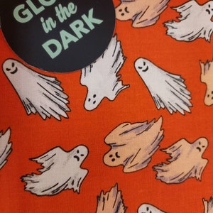 Mini ghosts glow in the dark orange Halloween  Fabric 100% cotton for clothing ,crafts and quilting ,B.T.Y. 1/4 1/2 3/4 fat  quarter