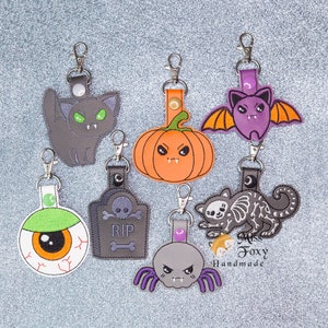 Halloween Theme Pumpkin Cat Spider Tombstone Bat Vinyl Keychain | Key Fob | Backpack Charm | Zipper Pull | Luggage Tag | Embroidered Vinyl