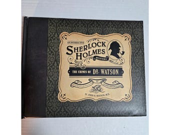 May include: A hardcover book titled An Interactive Sherlock Holmes Mystery: The Crimes of Dr. Watson. The cover features a tan label with black text and a silhouette of Sherlock Holmes, set against a dark green background with a damask pattern.