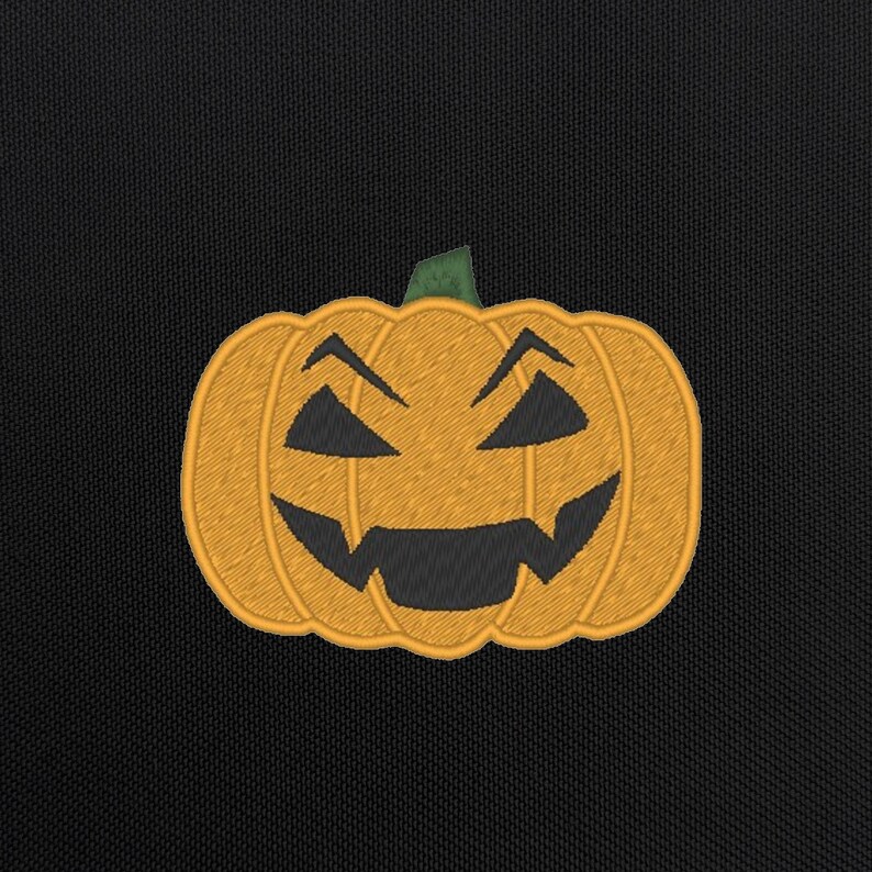 May include: A bright orange jack-o'-lantern with a carved, toothy grin and green stem. The pumpkin is embroidered on a black fabric background.