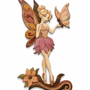 May include: Wooden fairy figurine with layered wood wings, dress, and butterfly. The fairy has blonde hair and is holding a butterfly. The base features a flower and decorative branch. The color palette includes shades of brown, pink, and tan.