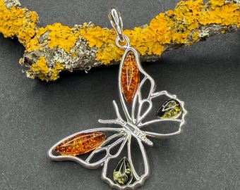 Mixed Amber butterfly pendant set in sterling silver,  Cognac and green  Amber, Baltic amber.