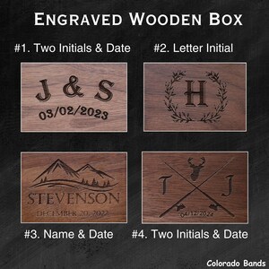 May include: Engraved wooden boxes with various designs. Options include initials and dates, a single letter initial with a wreath, a name and date with a mountain scene, and initials with crossed fishing rods and a deer head. The text "ENGRAVED WOODEN BOX" is at the top.