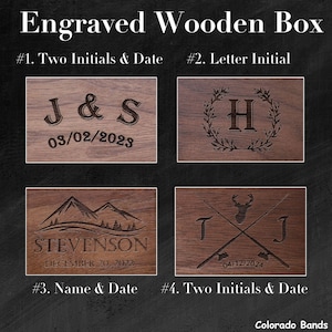 May include: Four examples of engraved wooden boxes with different designs. The first box has the initials "J & S" and the date "03/02/2023". The second box has the letter "H" in a wreath. The third box has the name "STEVENSON" and the date "DECEMBER 20, 2022". The fourth box has the initials "T & J" and the date "04/12/2024".