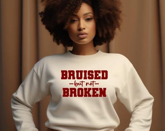 Sweat-shirt meurtri mais pas cassé