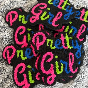 May include: A set of three ceramic mugs with a speckled, matte finish. The mugs are in shades of cream, light gray, and dark gray. Each mug has a simple, minimalist design, perfect for coffee or tea.