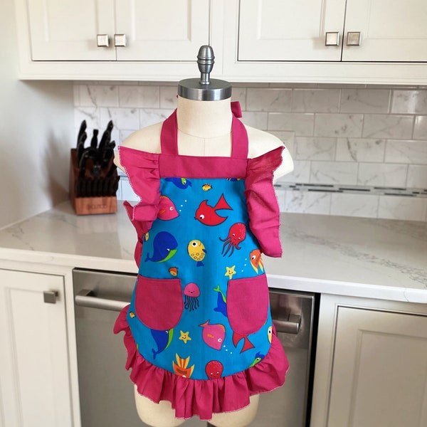 Children's playful apron in Cotton so bright and sunny any child would love to wear at a party or barbeque  by  loveandkissesbybella