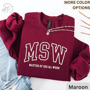 May include: Maroon sweatshirt with white text that reads "MSW Master of Social Work".