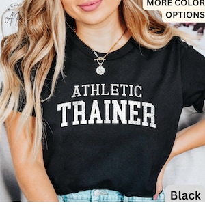 May include: Black t-shirt with white text that reads "Athletic Trainer".
