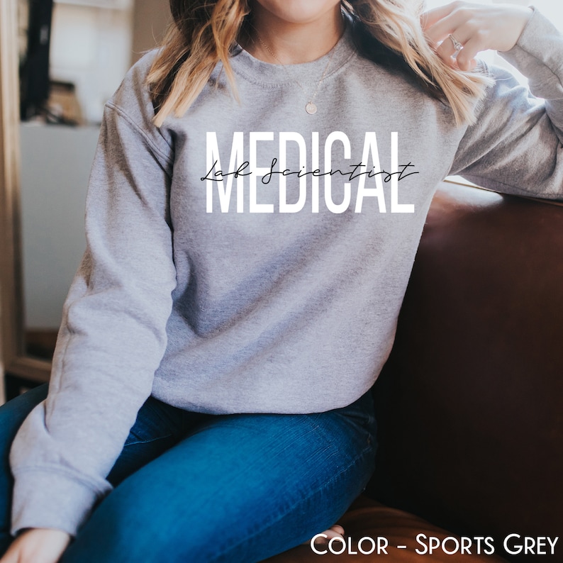May include: A gray sweatshirt with the text "Lab Scientist" and "MEDICAL" in white lettering.
