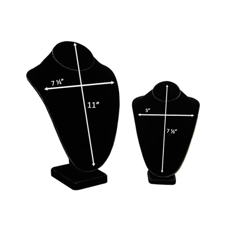 May include: Two black velvet necklace display stands. The larger stand is 11 inches tall and 7 1/2 inches wide. The smaller stand is 7 1/2 inches tall and 5 inches wide.