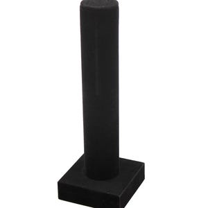 May include: A black jewelry display stand. The stand has a square base and a tall, cylindrical post. The post is designed to hold rings, bracelets, or necklaces. The stand is made of a soft, velvety material.