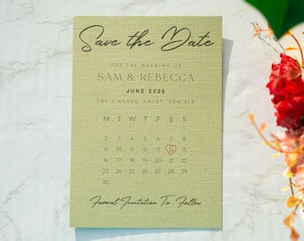 May include: Save the Date card with a green background and a calendar with a heart marking June 14th, 2025. The text reads "Save the Date" for the wedding of Sam & Rebecca, June 2025, The 3 Acres, Emley, HOB BER. Formal Invitation To Follow.
