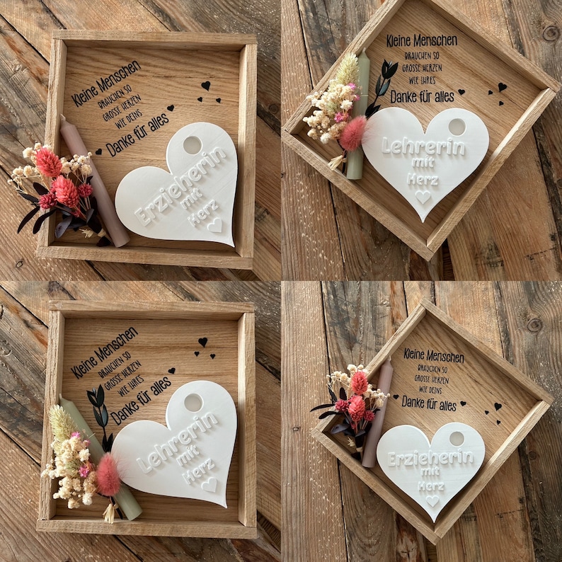 May include: Four wooden boxes with a heart-shaped plaque inside each. The plaques are white and have the words "Erzieherin mit Herz" and "Lehrerin mit Herz" written on them. The boxes also contain a small candle and dried flowers.