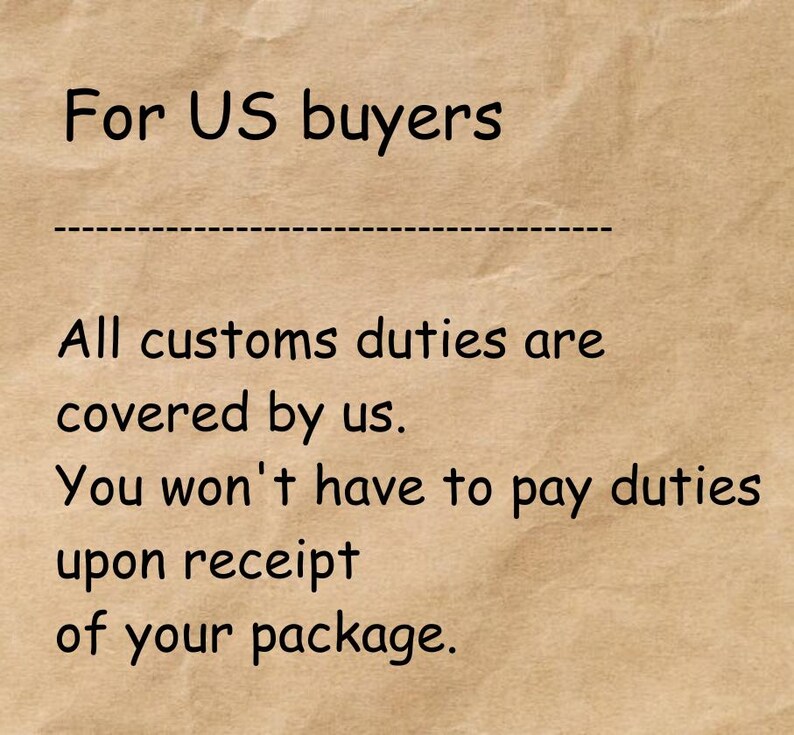 May include: A light brown, textured paper background featuring black text that reads: For US buyers. All customs duties are covered by us. You won't have to pay duties upon receipt of your package. The text is presented in a simple, sans-serif font.