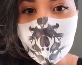 Adult Rorschach Design Mask Color Changing Moving Ink Blot Heat Activated Cosplay Face Mask. It really changes before your eyes