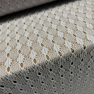 Cotton blend eyelet jacquard jersey fabric, per metre - silver grey