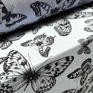 Scuba crepe stretch spandex jersey fashion fabric, per metre - butterflies print - pale blue
