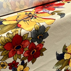 Printed single jersey fabric, per metre - Trailing Flowers print - cream with multicolour flowers