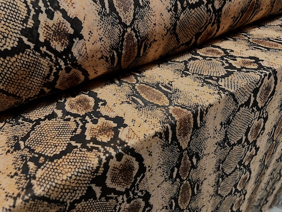 Tessuto elasticizzato a rete Power Mesh, al metro stampa pelle di serpente  nero e bronzo -  Italia