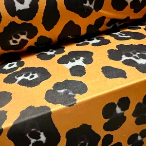 Weicher Touch Stretch Elasthan Jersey Stoff, pro Meter - Jaguar Tierprint - Bernstein