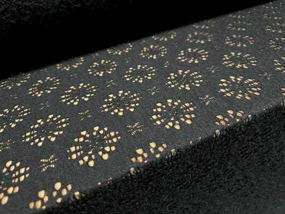 Broderie Anglais cotton blend spandex stretch jersey dress fabric, per metre - black