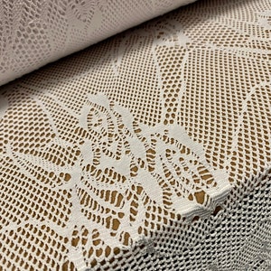 Fishnet 4 way stretch jersey fabric with floral design, per metre - white