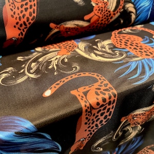 Power mesh net stretch spandex fabric, per metre - Leopardskin & feathers print - black orange blue