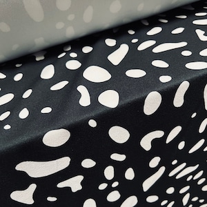Scuba crepe  stretch spandex jersey dress fabric, per metre - puddle print - black & white