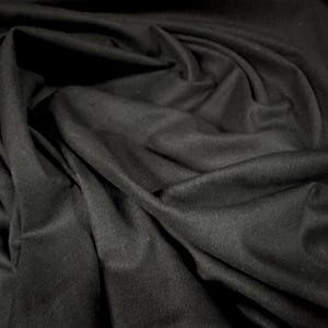 Cotton iron on fusible interfacing fabric, per metre - black