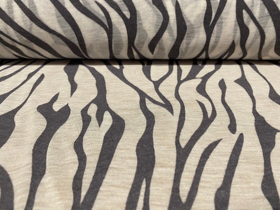 per metre Cotton blend zebra print devor\u00e9 burnout single jersey fabric Stone & green