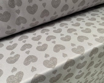 Sudadera de lana suave tejido jersey, por metro - lila pálido con estampado gris corazones de amor