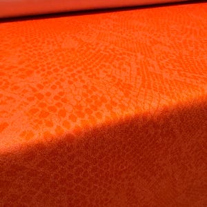 Scuba crepe stretch spandex jersey fabric, per metre - Snakeskin print - Orange